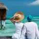 Photo d'un couple en vacances aux Maldives