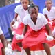 Photo d'enfants faisant une danse traditionnelle congolaise