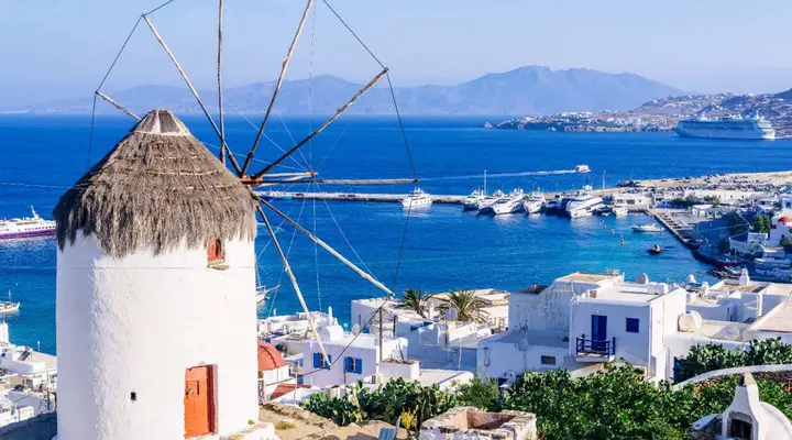 Un moulin sur l'île de Mykonos en Grèce Réservez votre voyage en Grèce sur l'île de Mykonos au meilleur prix